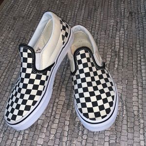 Black and white checkered slip on vans